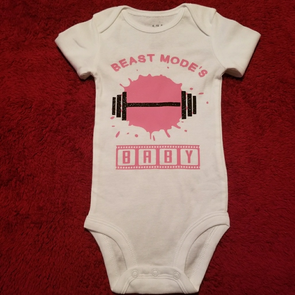 "BEAST MODE'S BABY" ONESIE.
